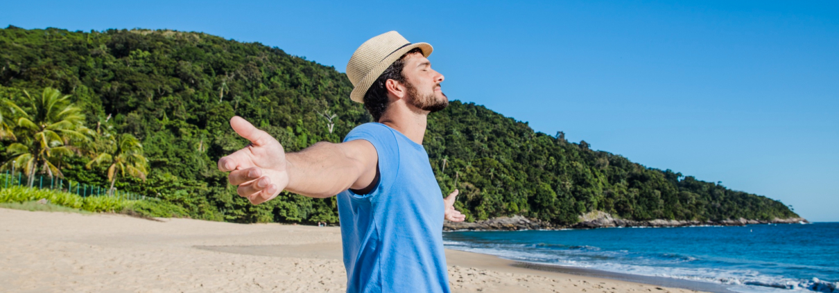 Man relaxing on a tropical beach enjoying a luxurious island getaway