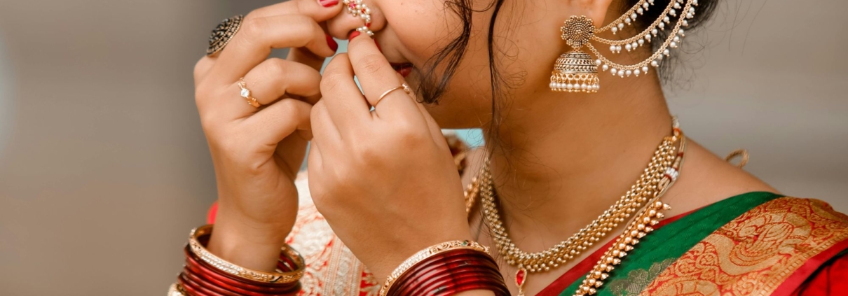 An Indian bride wearing wedding dress bought from bridal wear shops
