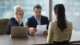 Interviewer checking the resume of a candidate