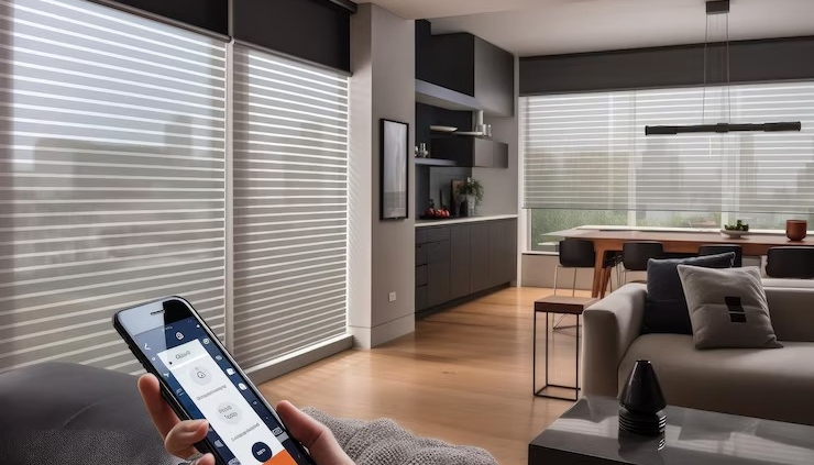 A person using a smartphone to control smart blinds in a modern, automated living and dining room.